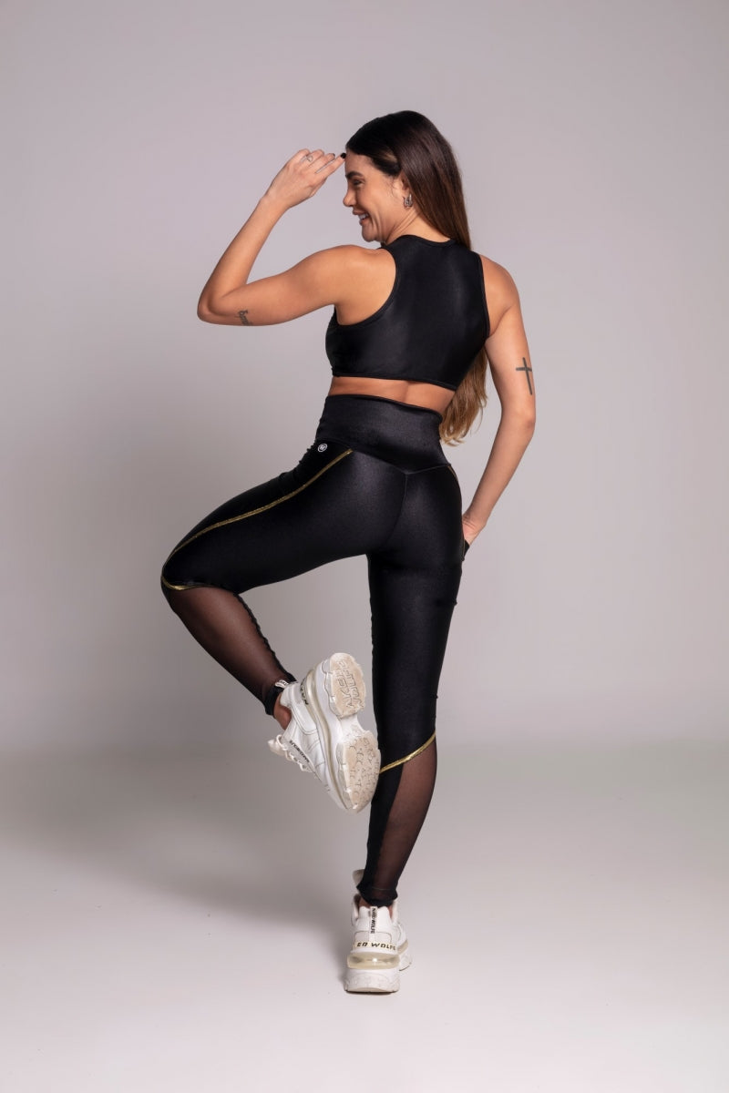 Calza deportiva mujer Gravity Preta Cós