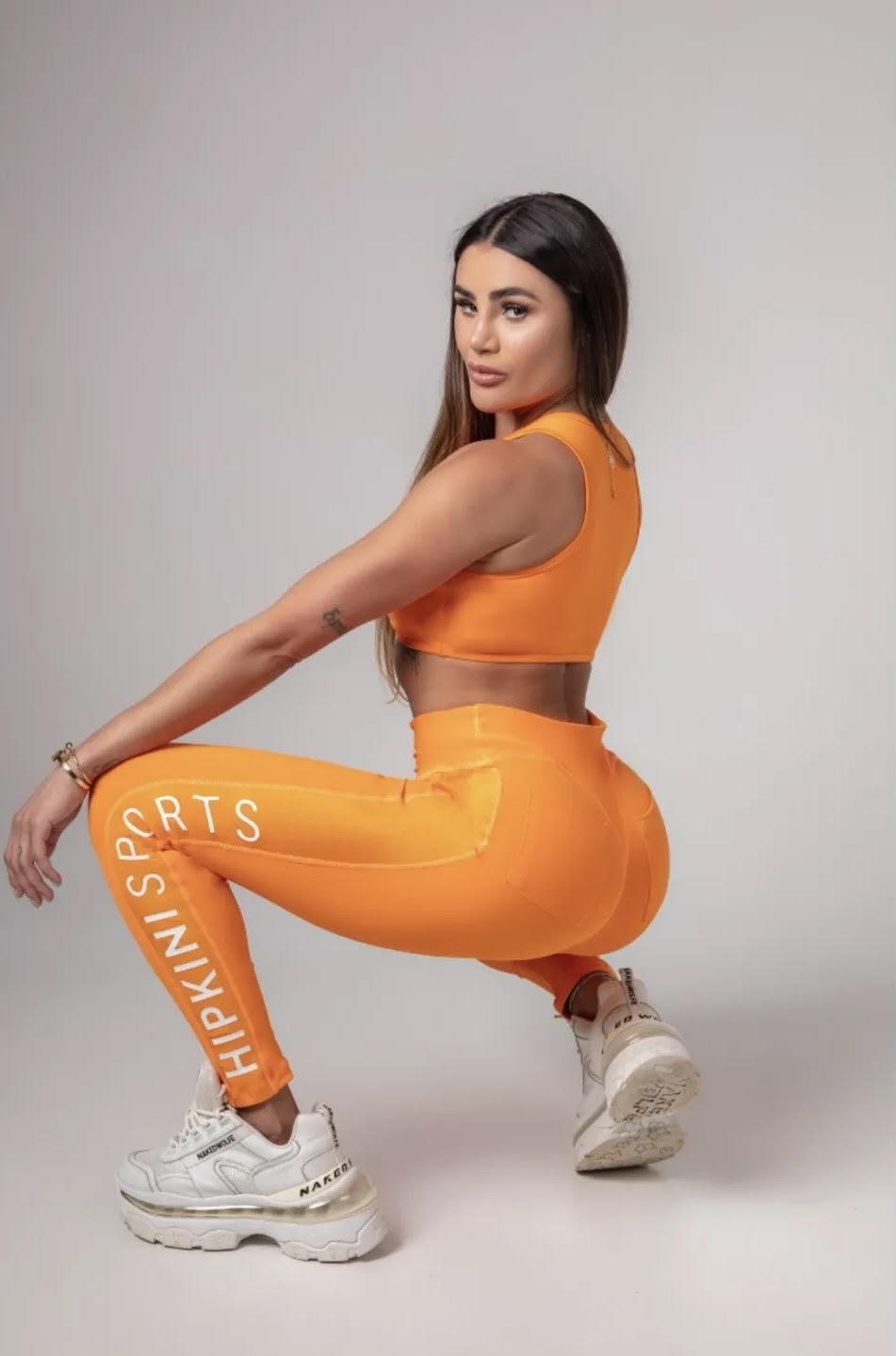 Calza deportiva mujer naranja